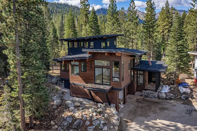 a view of a chairs and table on the wooden floor