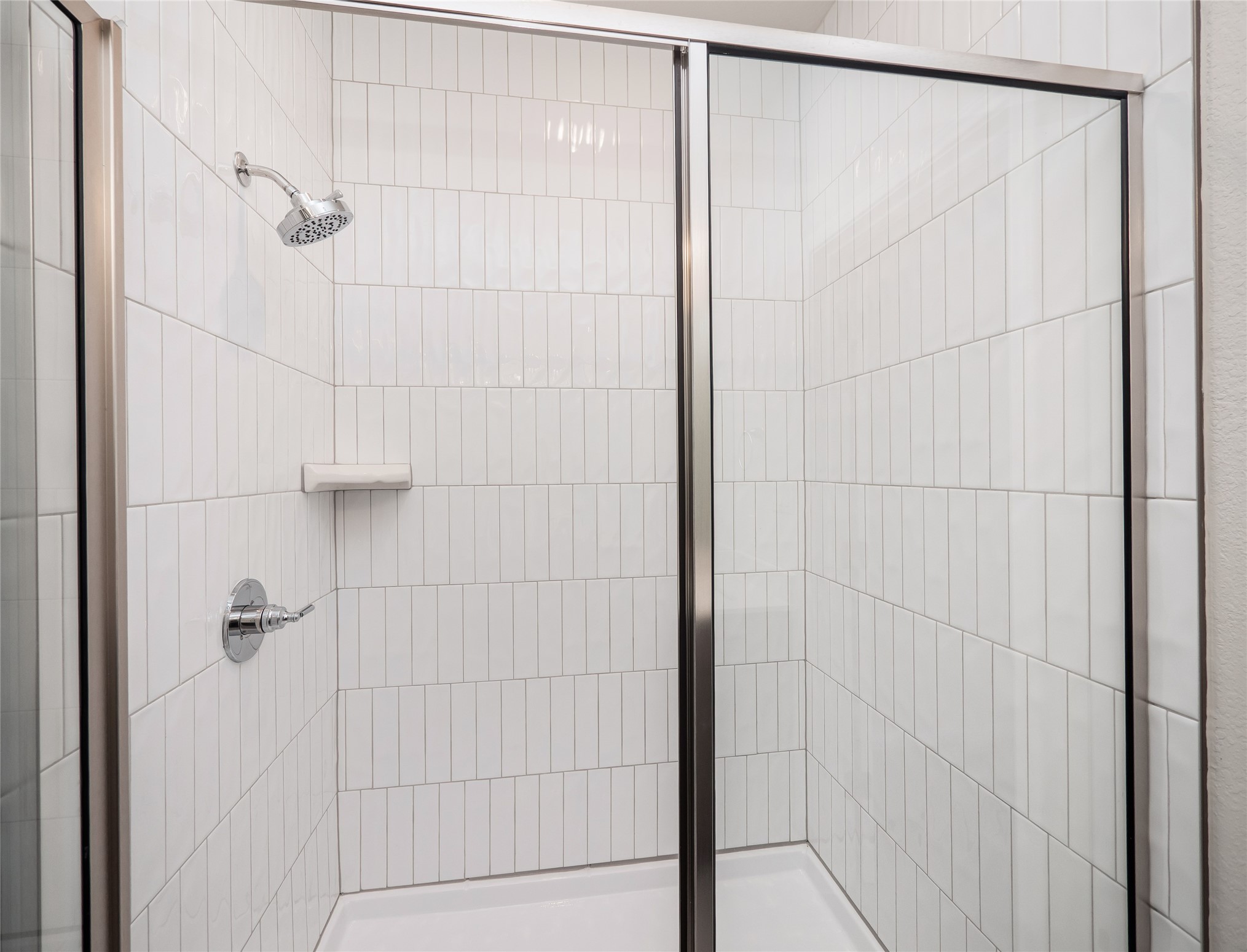 181 Soldier Street Kyle, TX 78640 - Photo 17 of 37 a bathroom with a shower