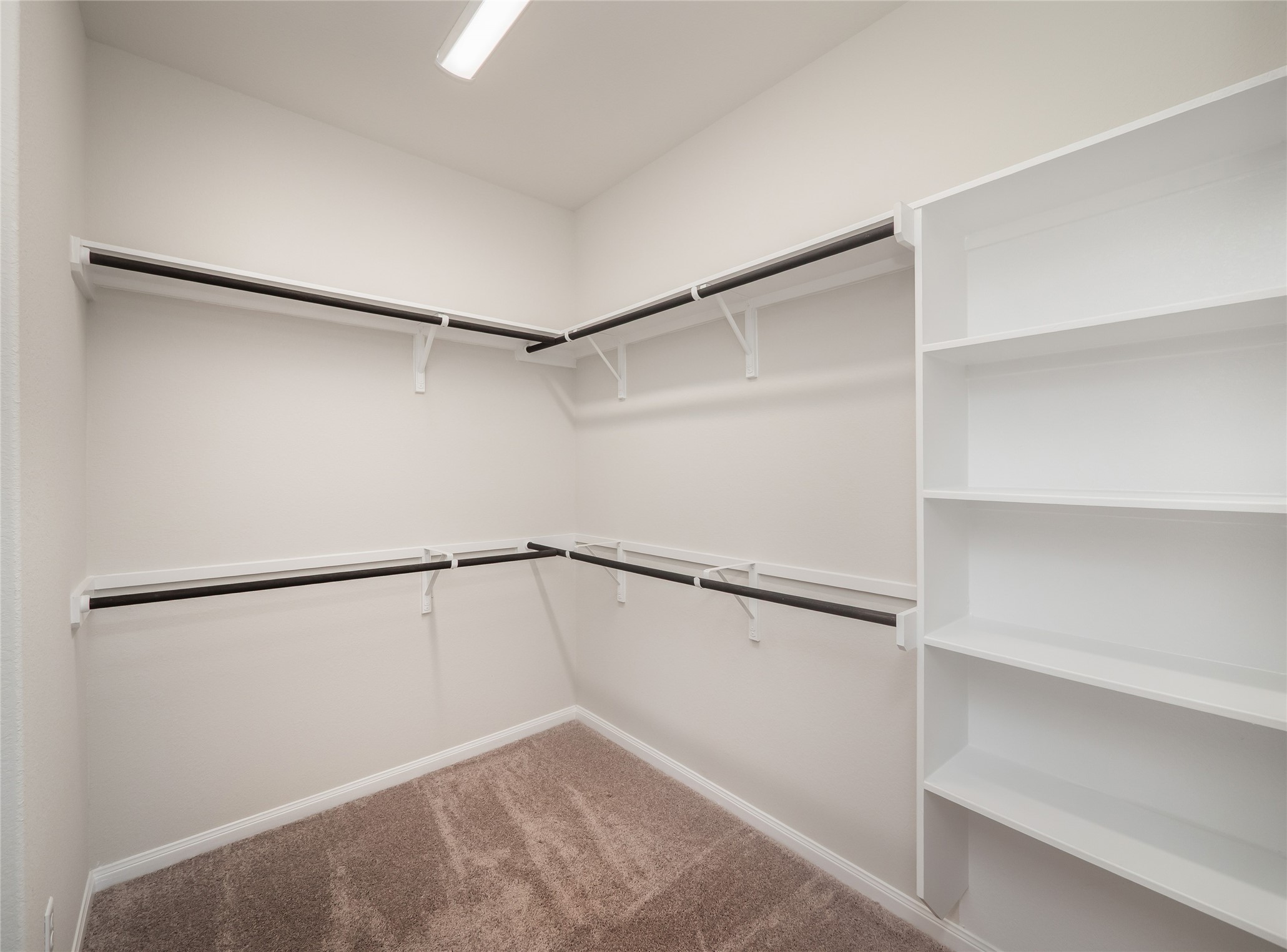 181 Soldier Street Kyle, TX 78640 - Photo 18 of 37 a view of an empty walk in closet