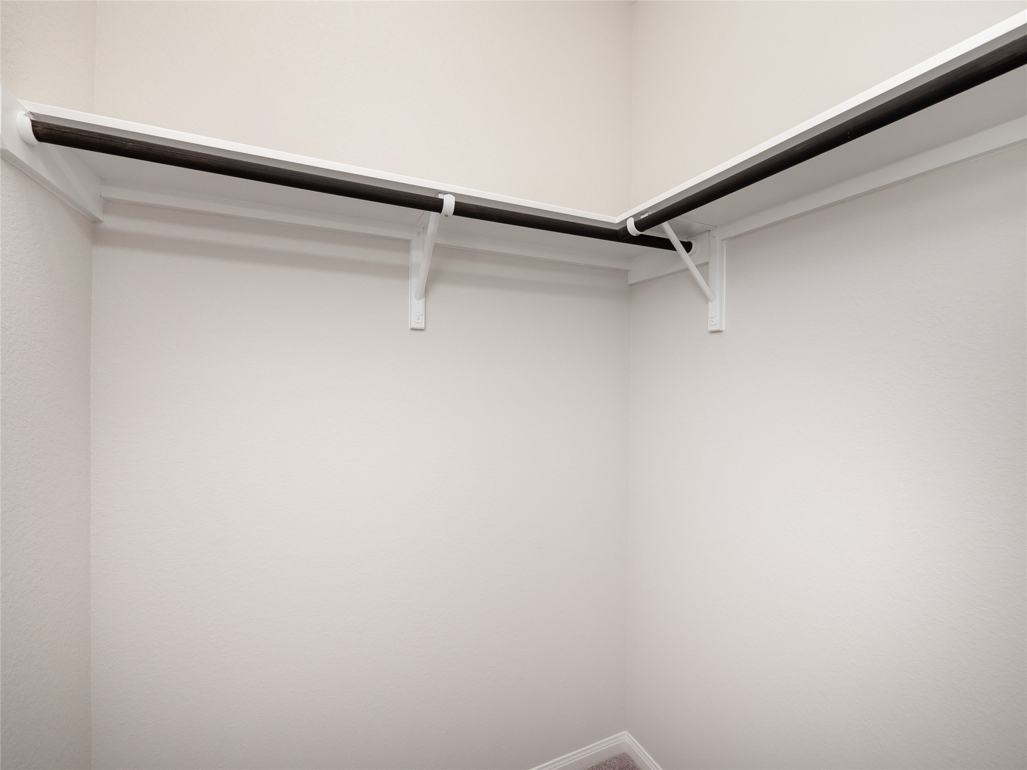 181 Soldier Street Kyle, TX 78640 - Photo 21 of 37 a view of a rack on the wall