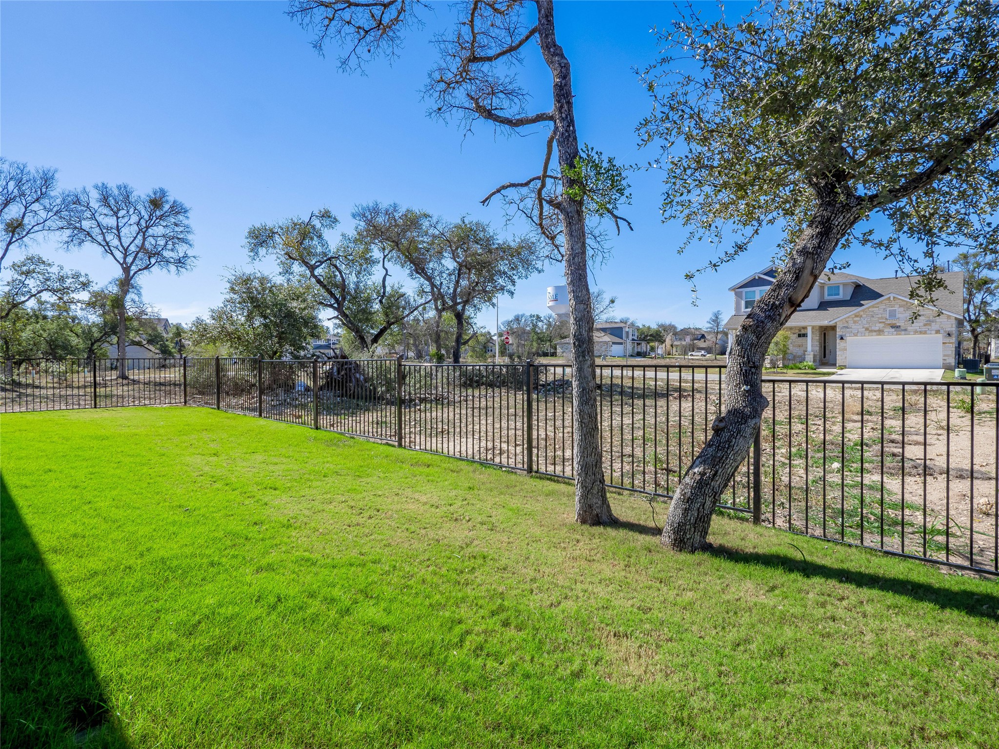 181 Soldier Street Kyle, TX 78640 - Photo 28 of 37 a view of a garden with a tree in the park