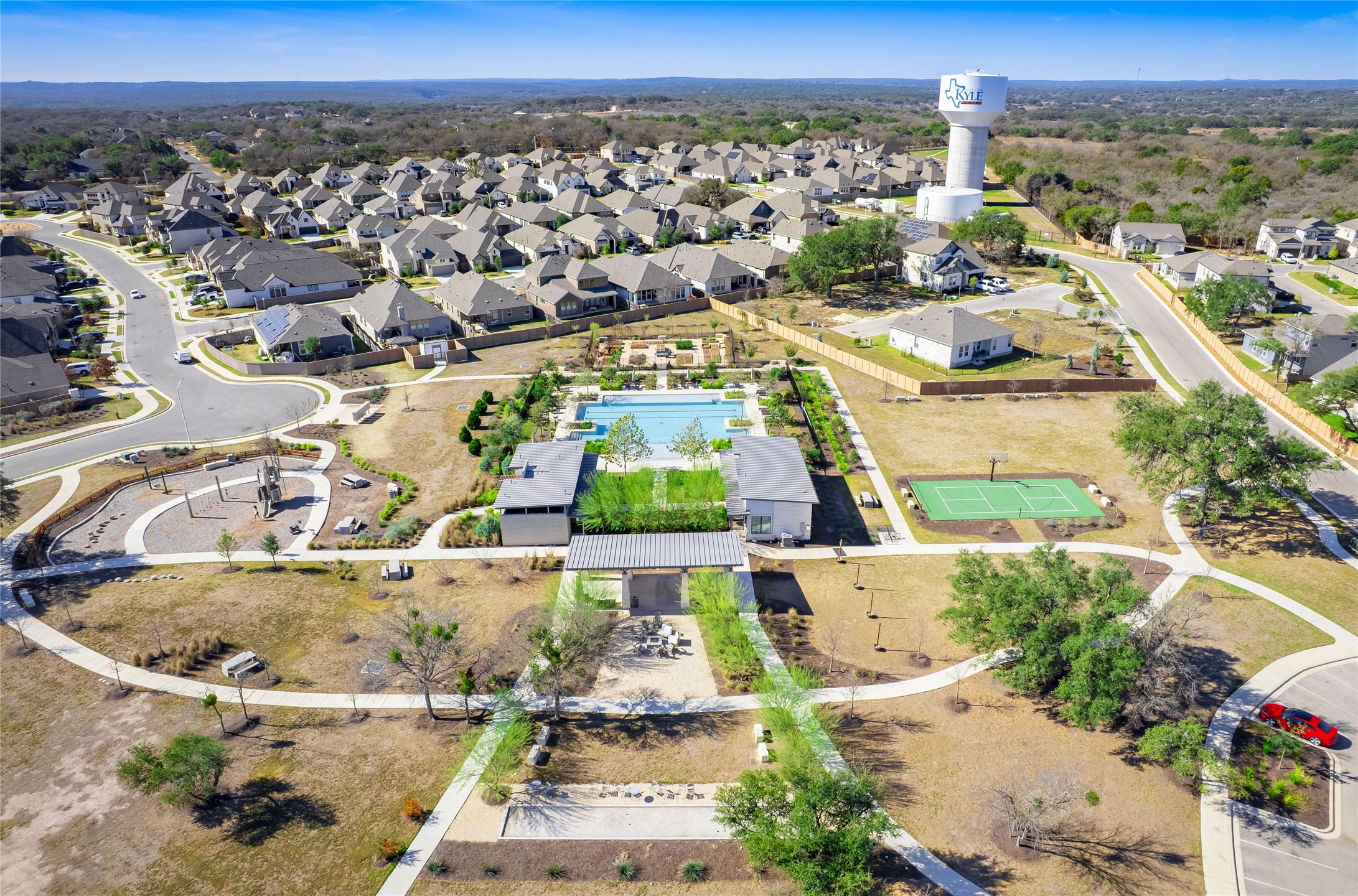 181 Soldier Street Kyle, TX 78640 - Photo 33 of 37 an aerial view of residential houses with outdoor space
