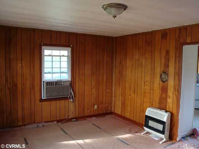 223 Evans Mill Road Dillwyn, VA 23936 - Photo 5 of 11 an empty room with windows