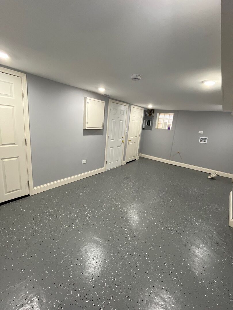 7438 South Champlain Avenue Chicago, IL 60619 - Photo 37 of 41 an empty room with windows