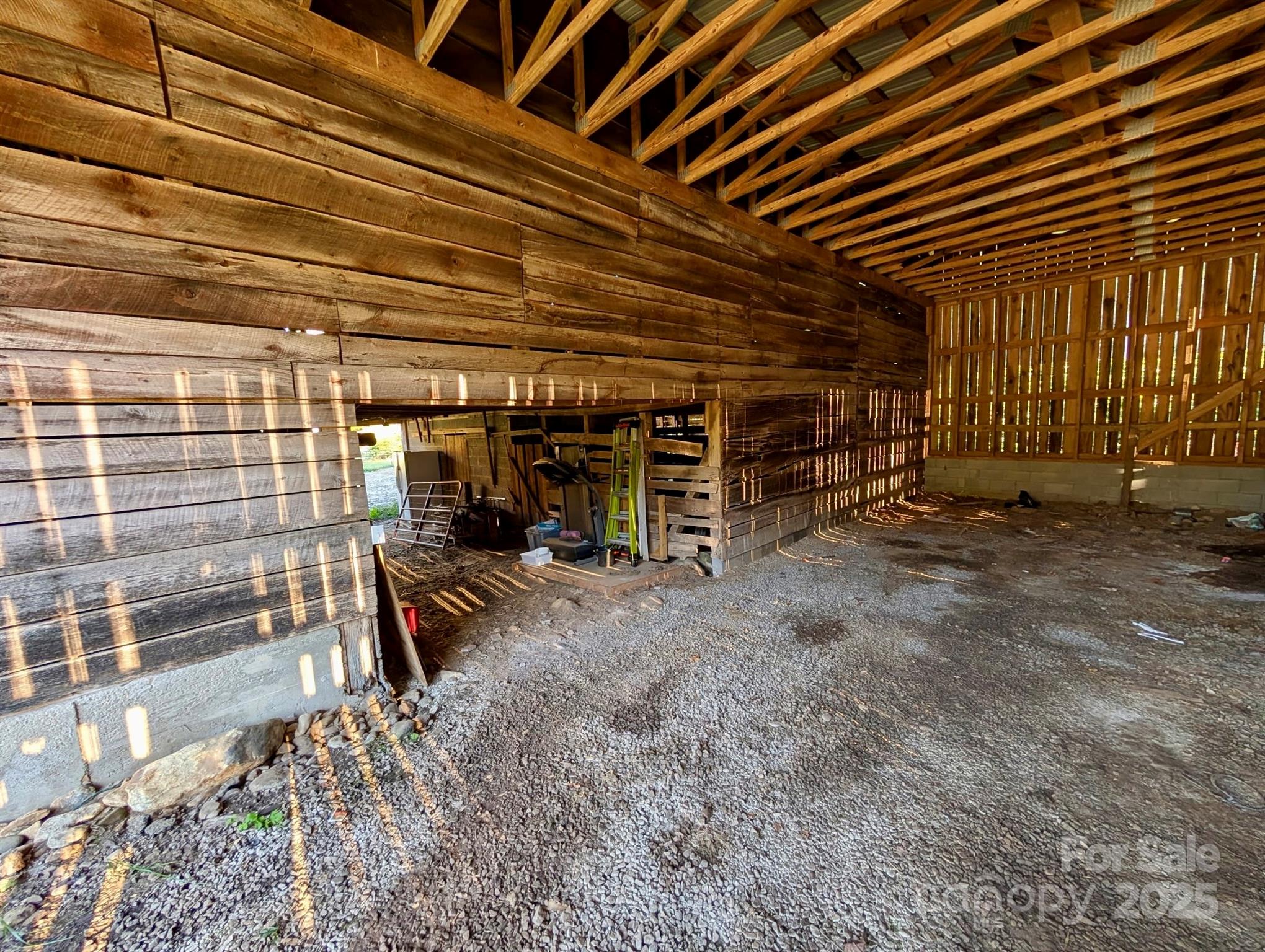 718 Bald Mountain Road Burnsville, NC 28714 - Photo 24 of 37 a view of a room with wooden walls