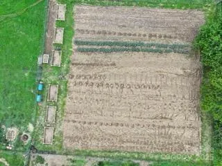 a brick building with a yard