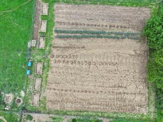 718 Bald Mountain Road Burnsville, NC 28714 - Photo 34 of 37 a brick building with a yard