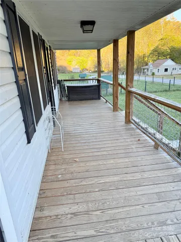 a view of balcony with furniture