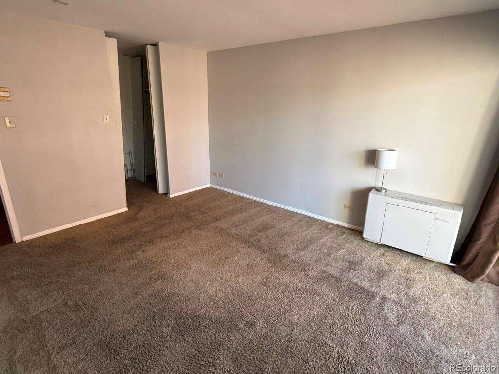 888 Logan Street, Unit 5H Denver, CO 80203 - Photo 11 of 25 a view of a room with an empty space
