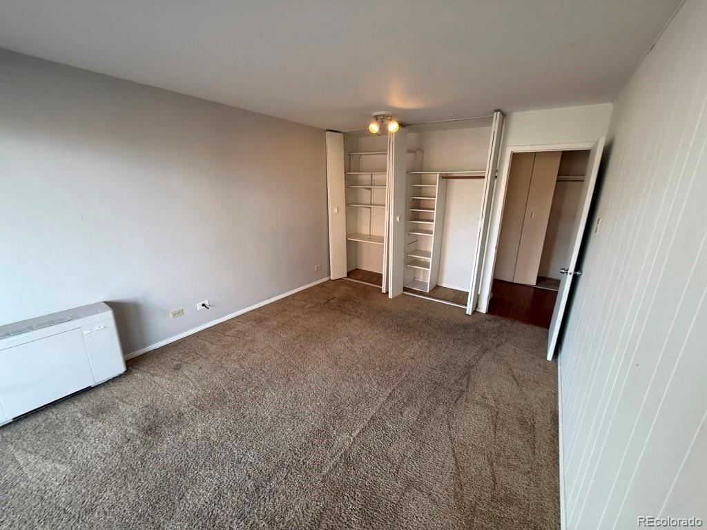 888 Logan Street, Unit 5H Denver, CO 80203 - Photo 14 of 25 an empty room with a bathroom