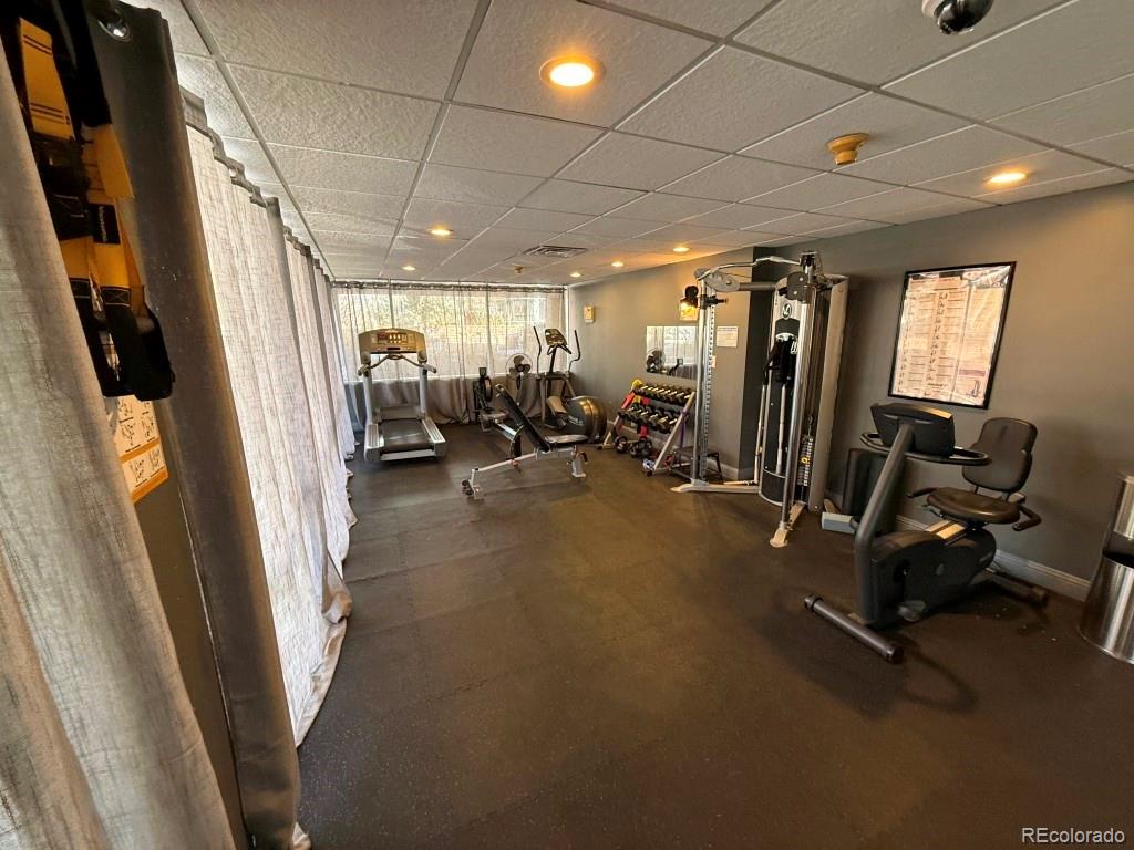 888 Logan Street, Unit 5H Denver, CO 80203 - Photo 20 of 25 a view of a room with gym equipment
