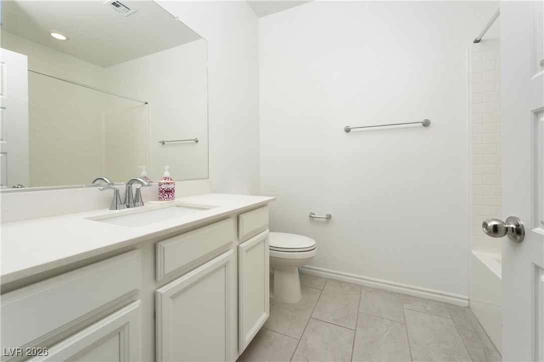 7330 North Decatur Boulevard, Unit 1 North Las Vegas, NV 89084 - Photo 24 of 29 Full bath with vanity and shower / bathtub combination