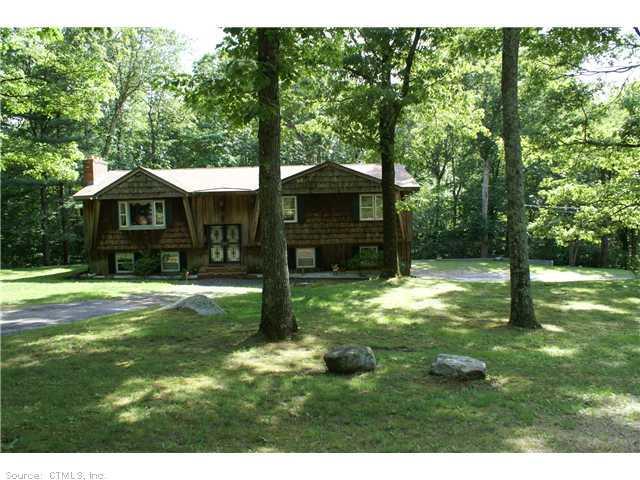 531 Little City Road Haddam, CT 06441 - Photo 1 of 1 a backyard of a house with table and chairs