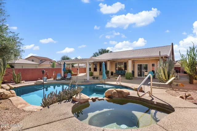 a view of a backyard with a patio