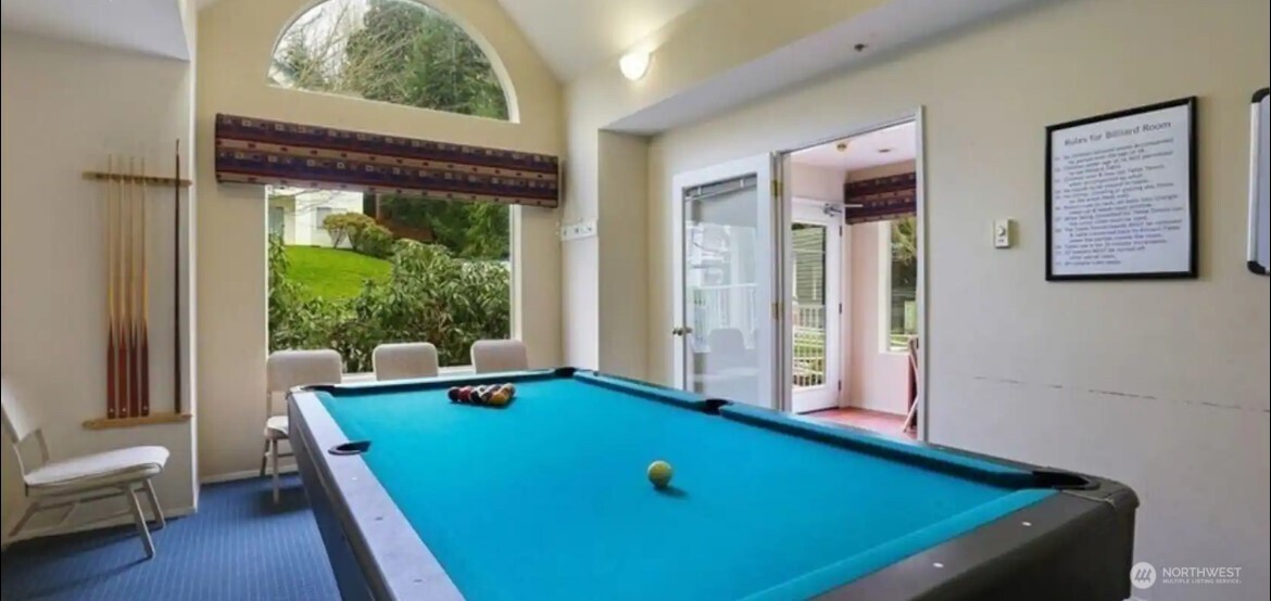 5000 Lake Washington Boulevard Northeast, Unit F105 Renton, WA 98056 - Photo 27 of 27 a room with furniture pool table and windows