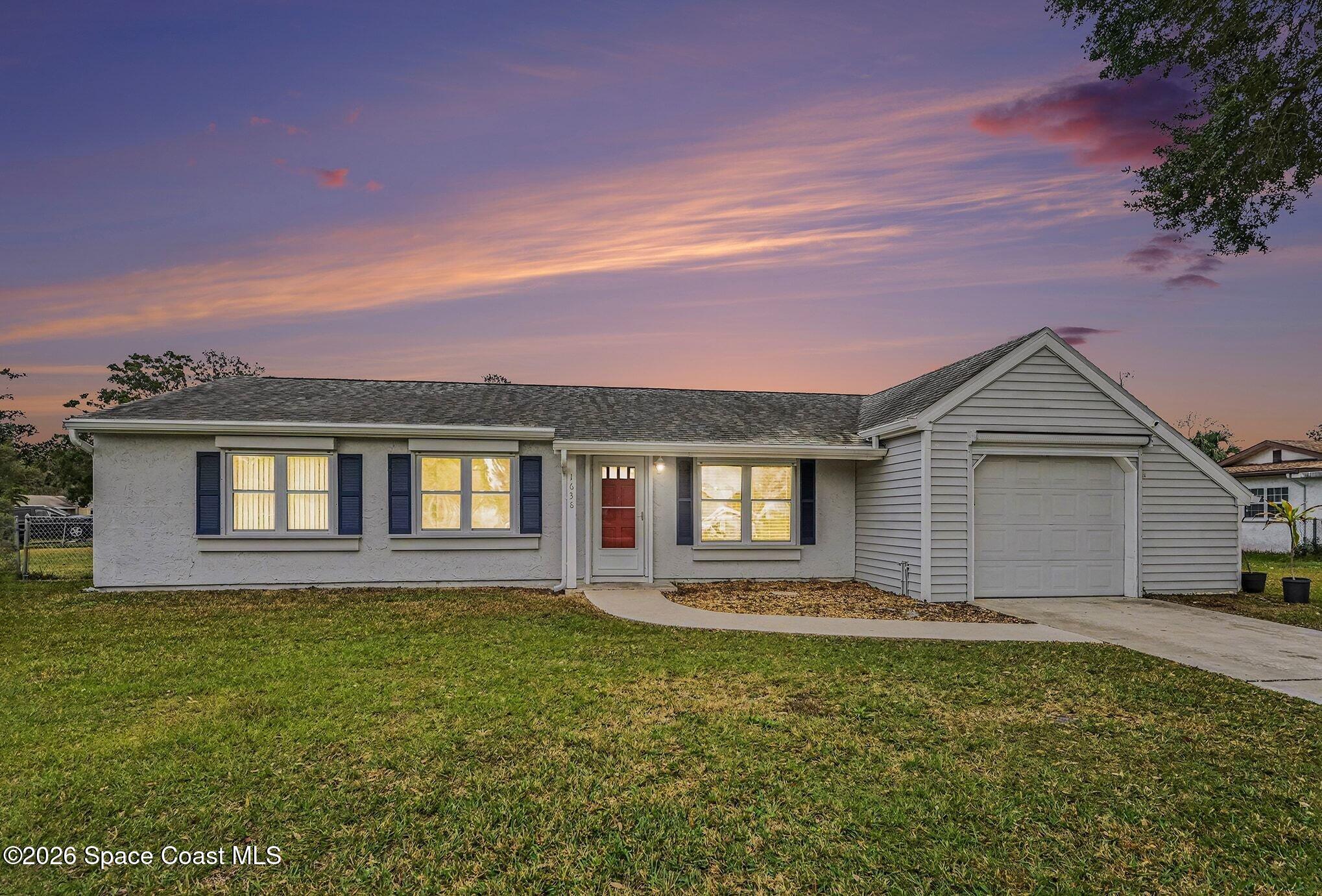 front view of house with a yard