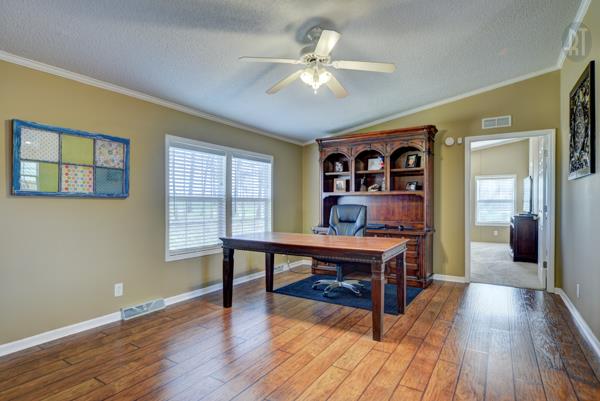 4339 South Garrett Road Springfield, TN 37172 - Photo 3 of 28 a living room with furniture and a wooden floor