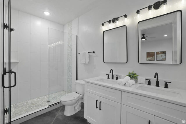 4346 Canterbury Road Hurricane, UT 84737 - Photo 16 of 37 Full bathroom with a shower stall, double vanity, and recessed lighting