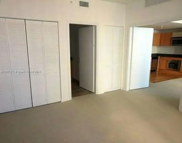 a view of a room with an empty space