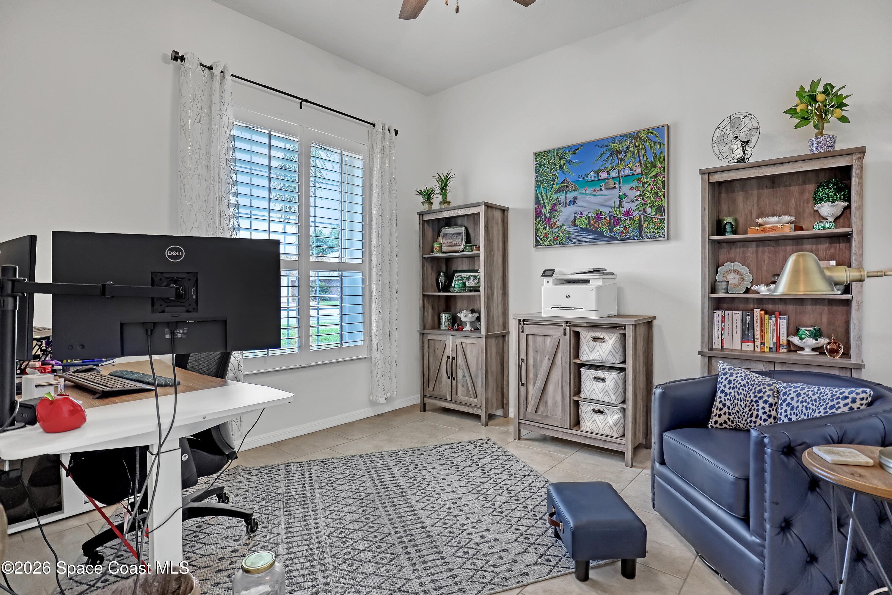 3120 Forest Creek Drive Melbourne, FL 32901 - Photo 42 of 59 a workspace with furniture and window