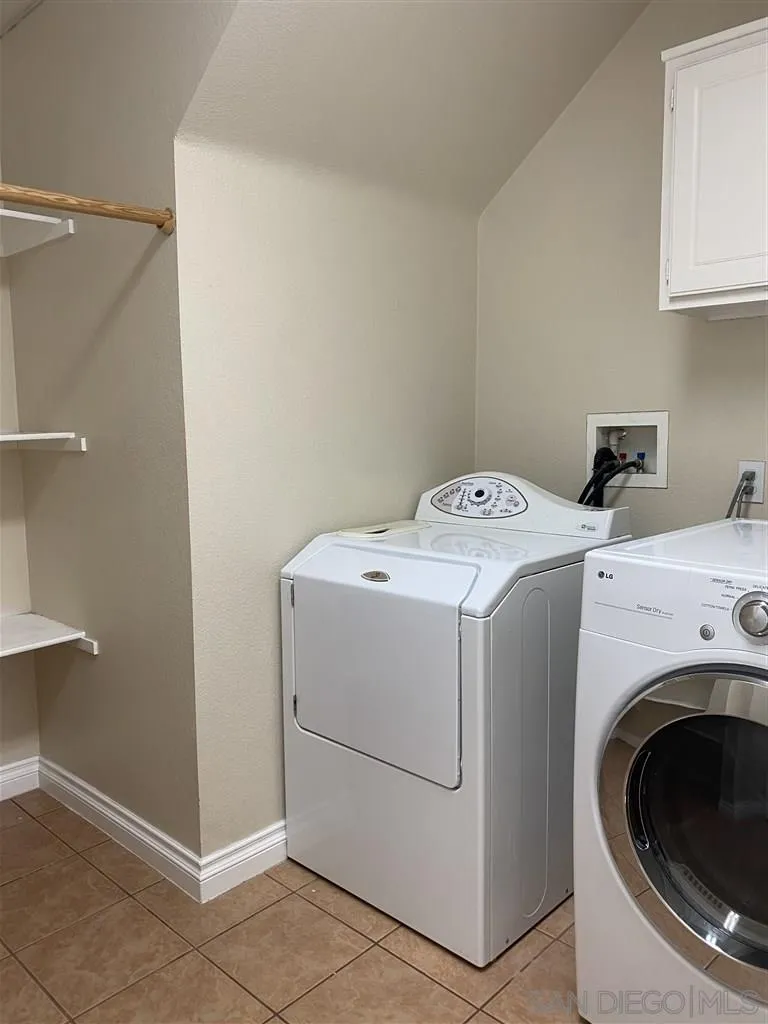 33734 Abbey Road Temecula, CA 92592 - Photo 13 of 25 a utility room with dryer and washer