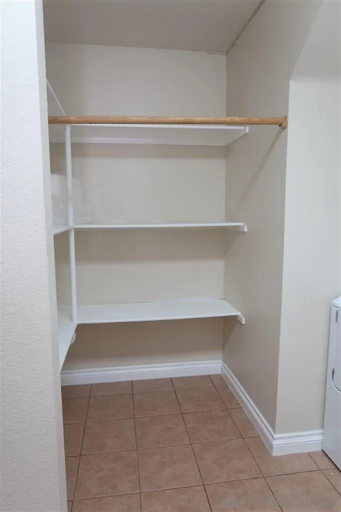 33734 Abbey Road Temecula, CA 92592 - Photo 14 of 25 a view of an empty walk in closet