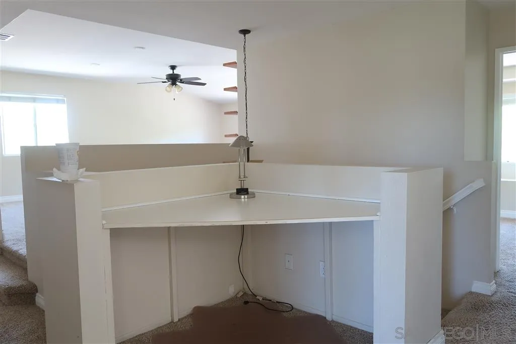 33734 Abbey Road Temecula, CA 92592 - Photo 18 of 25 a bathroom with a sink and mirror