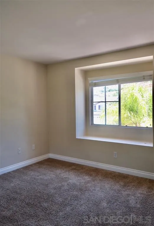 33734 Abbey Road Temecula, CA 92592 - Photo 25 of 25 a view of an empty room with a window