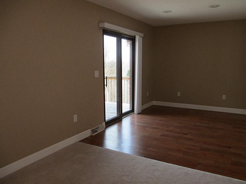 1317 Jefferson Heights Road Pittsburgh, PA 15235 - Photo 9 of 12 Master Bedroom. Slidder to back deck