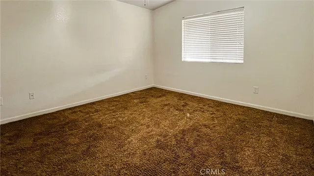 an empty room with closet