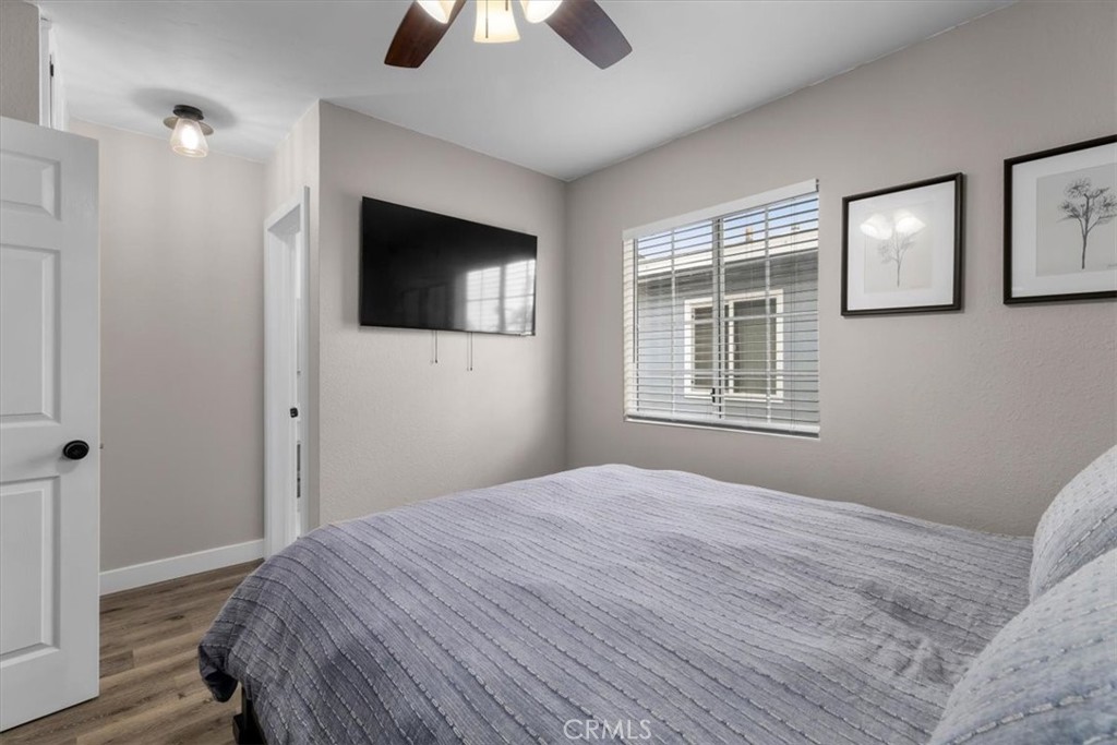 338 East 219th Street Carson, CA 90745 - Photo 17 of 36 a bedroom with a bed and a window