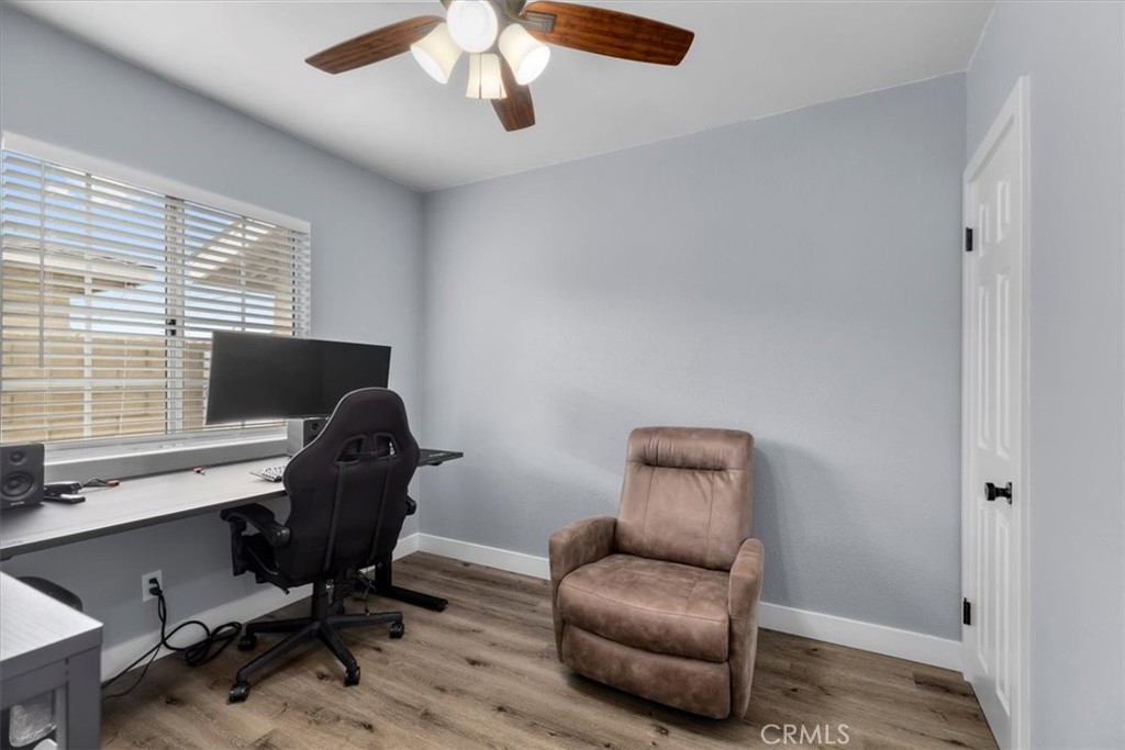 338 East 219th Street Carson, CA 90745 - Photo 28 of 36 a view of workspace with wooden floor and windows