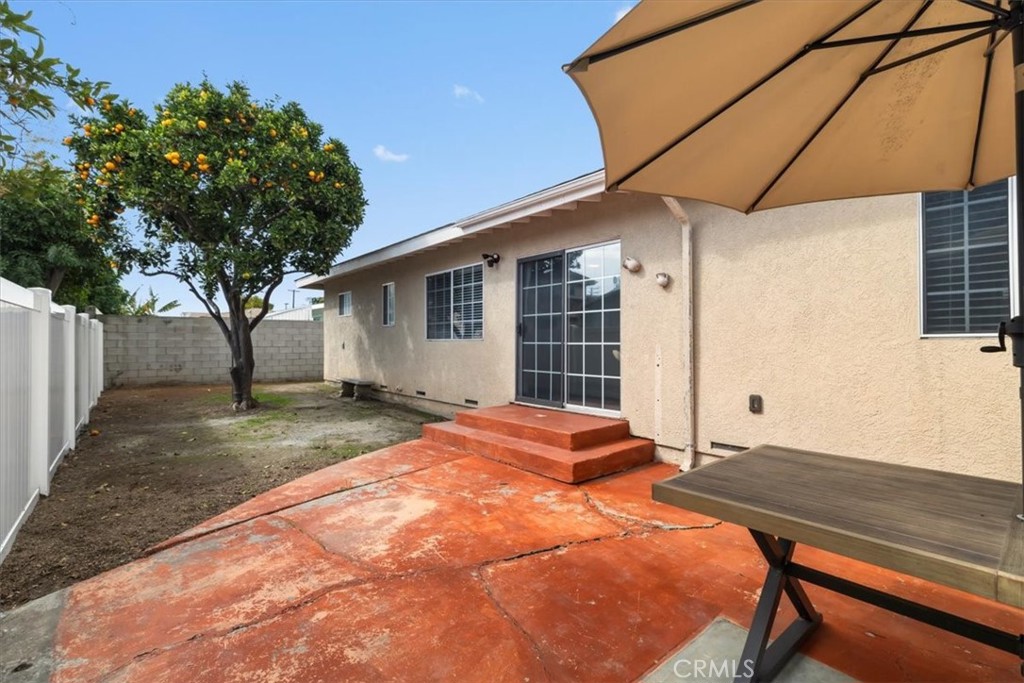 338 East 219th Street Carson, CA 90745 - Photo 32 of 36 a house with trees in front of it
