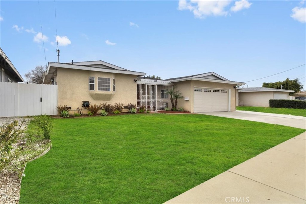 338 East 219th Street Carson, CA 90745 - Photo 35 of 36 a view of a house with a yard
