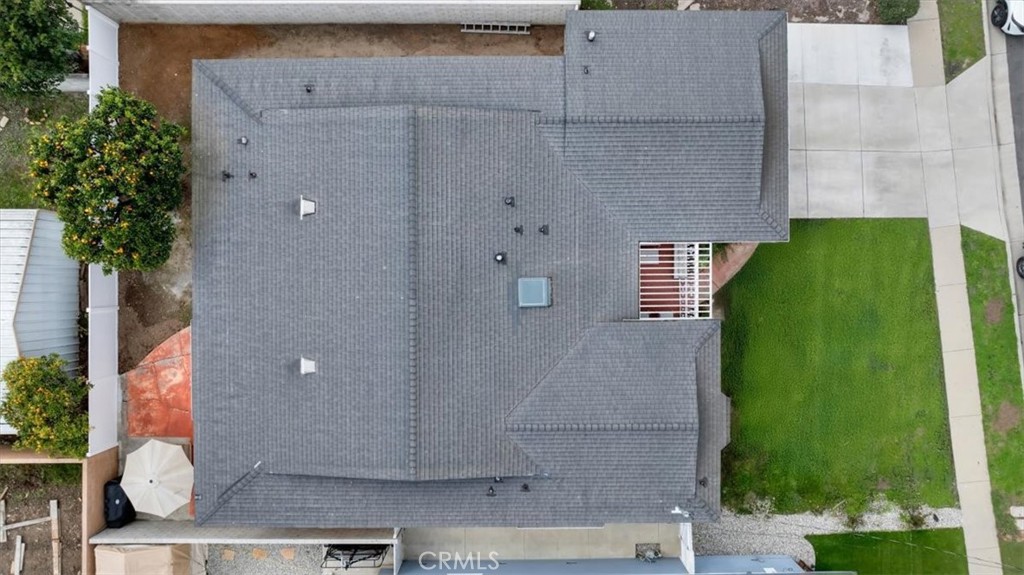 338 East 219th Street Carson, CA 90745 - Photo 36 of 36 an aerial view of a residential apartment building with a yard and plants