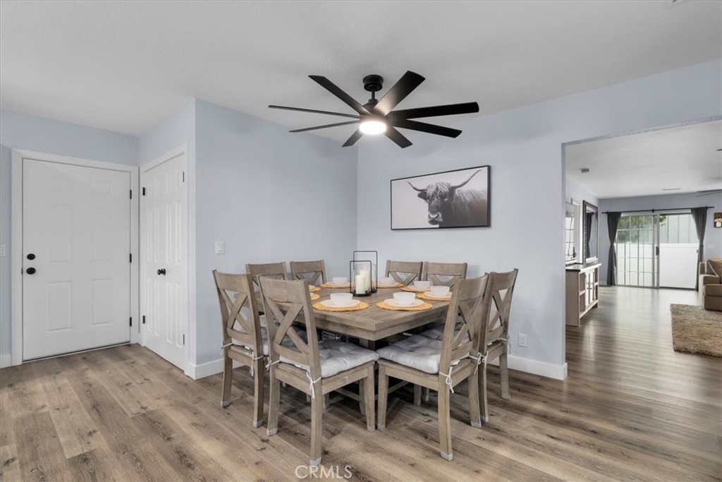 338 East 219th Street Carson, CA 90745 - Photo 4 of 36 a view of a dining room with furniture and wooden floor