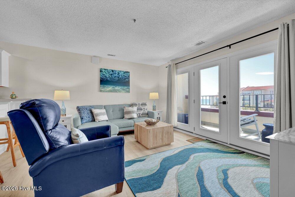 790 New River Inlet Road, Unit 307B North Topsail Beach, NC 28460 - Photo 9 of 45 Living Room