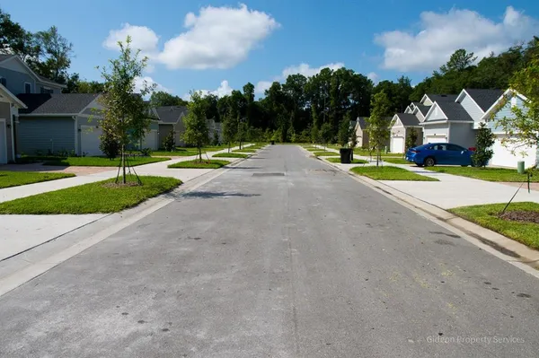 a view of house with outdoor space and street view
