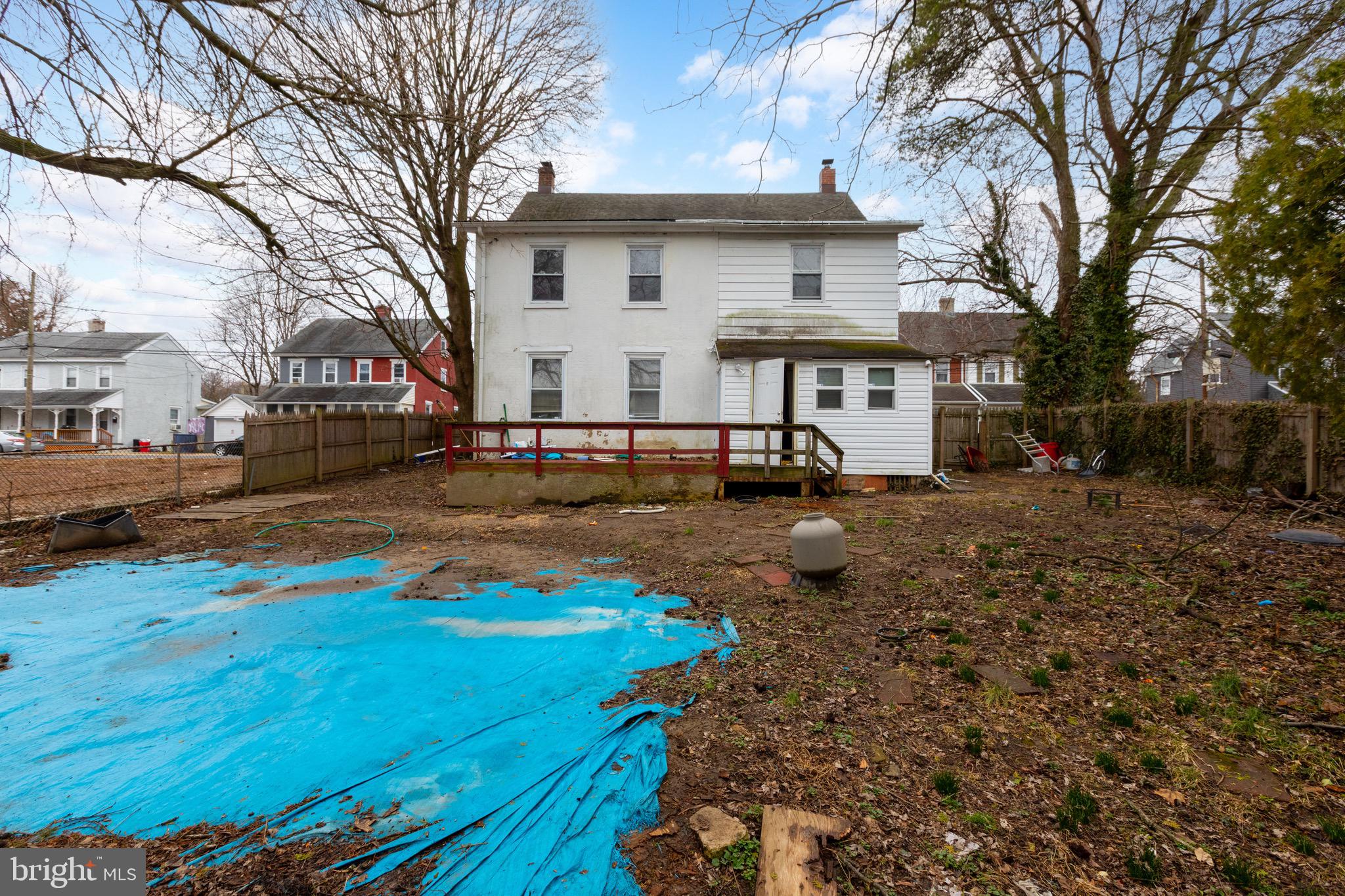 15 7th Street Brookhaven, PA 19015 - Photo 29 of 33 a view of a white house with a yard covered with snow