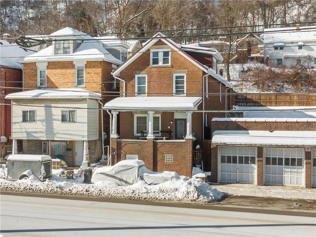 421 Freeport Road Creighton, PA 15030 - Photo 2 of 25 a front view of a house with a porch