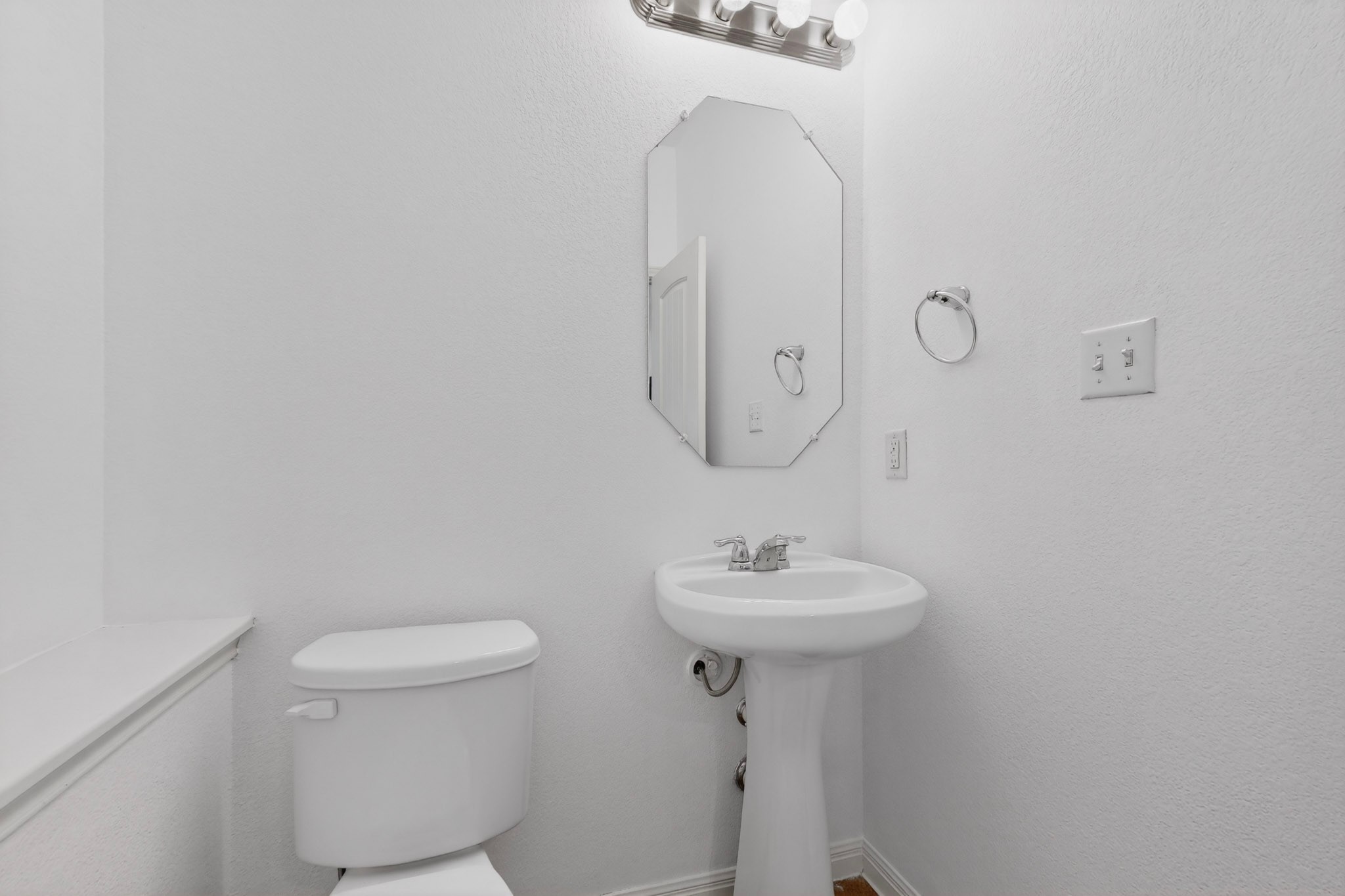 4619 Inicio Lane Austin, TX 78725 - Photo 13 of 32 a bathroom with a sink toilet