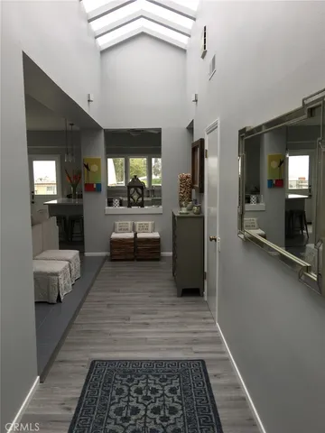 a lobby with furniture and window