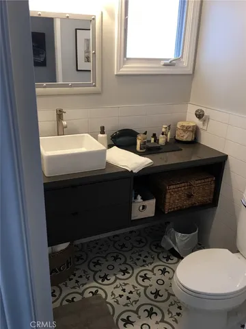 a bathroom with a sink and a toilet