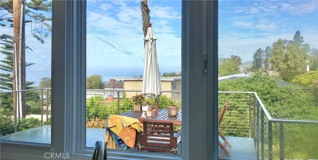 a view of a balcony with chair