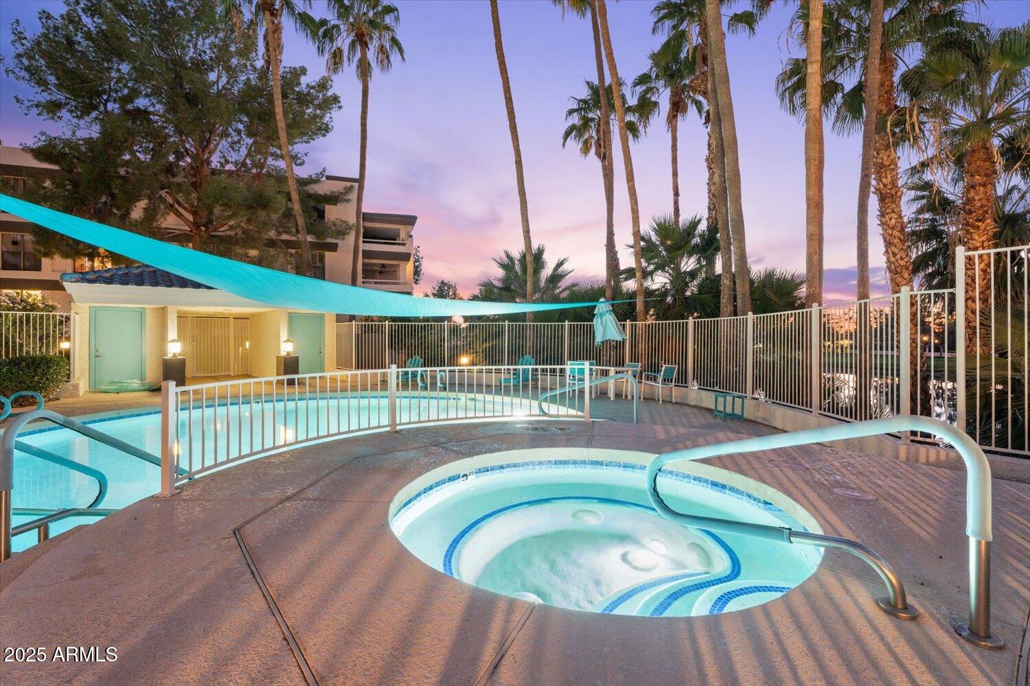 5122 North 31st Way, Unit 221 Phoenix, AZ 85016 - Photo 34 of 41 a view of a swimming pool with a garden