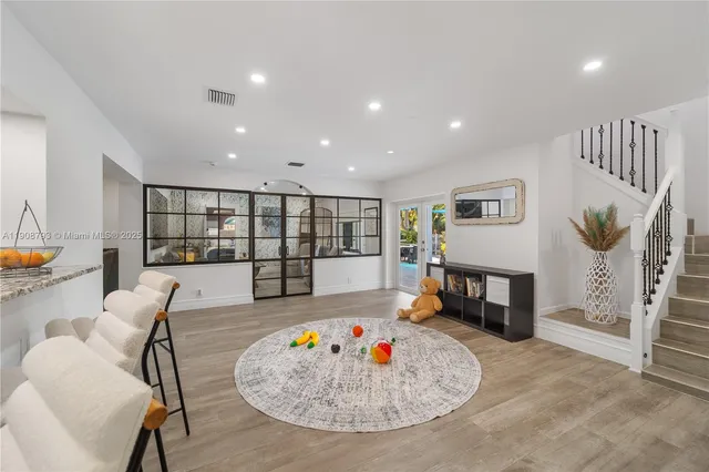 a living room with furniture and a table