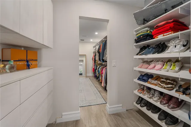 a view of a closet with storage