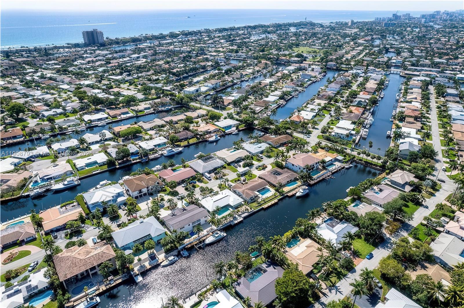4011 Northeast 26th Avenue Lighthouse Point, FL 33064 - Photo 32 of 35 an aerial view of a city with lots of residential buildings