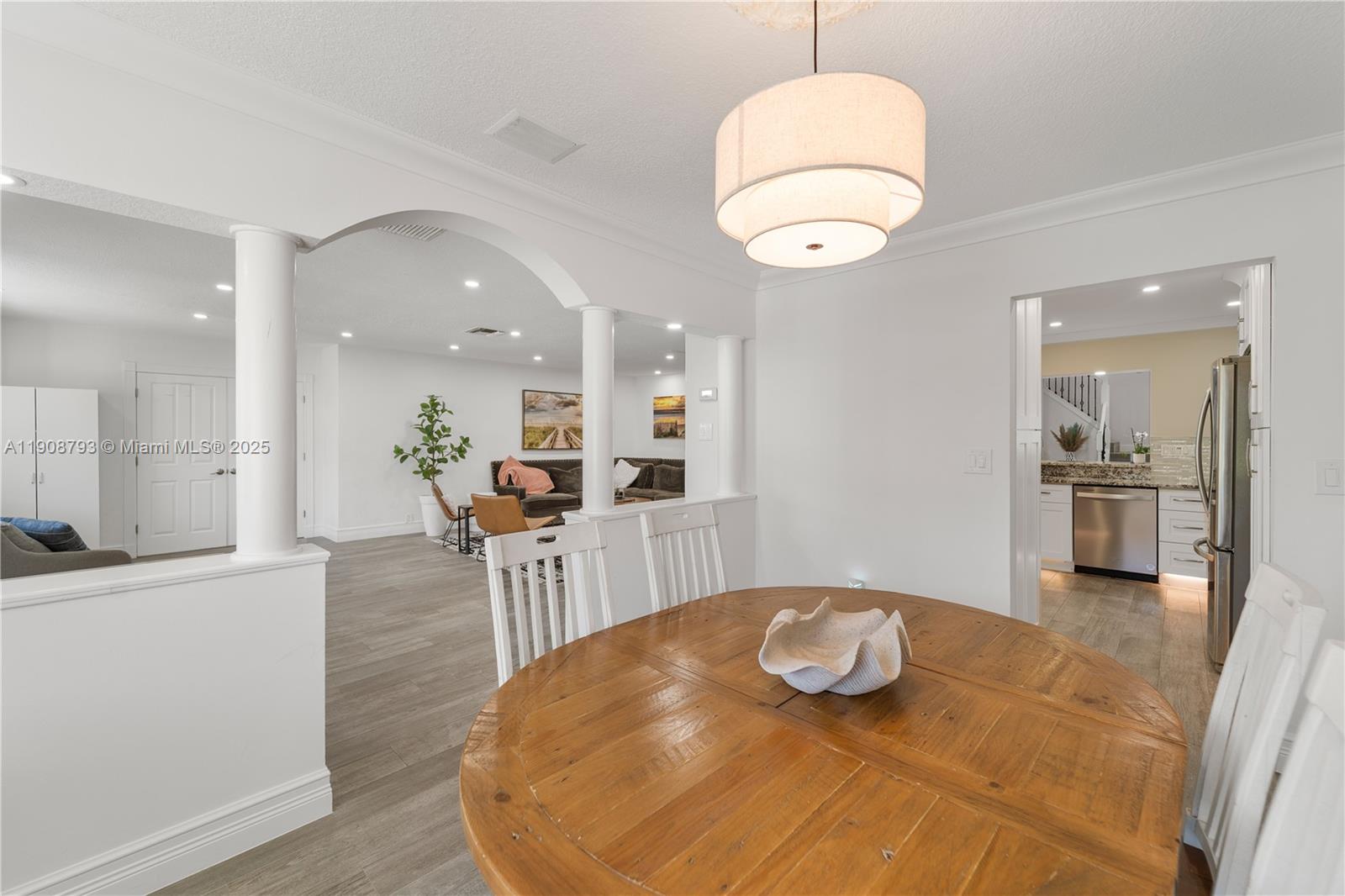 4011 Northeast 26th Avenue Lighthouse Point, FL 33064 - Photo 7 of 35 a view of a kitchen and dining room