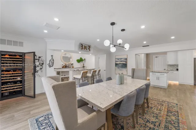 a view of a dining room with furniture